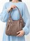 Женская сумка ICONIC BAGS с короткими ручками имеет средний объем и мягкую форму для ношения на плече 1000042515