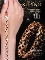 Украшение на женской руке - браслет с фианитами, покрытый золотом, от ювелирного бренда XUPING 1000023106