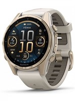 Золотистый корпус и дымчато-серый ремешок отличают смарт-часы Garmin Fenix 8 43 мм Sapphire под номером 010-02903-11. 1000026855